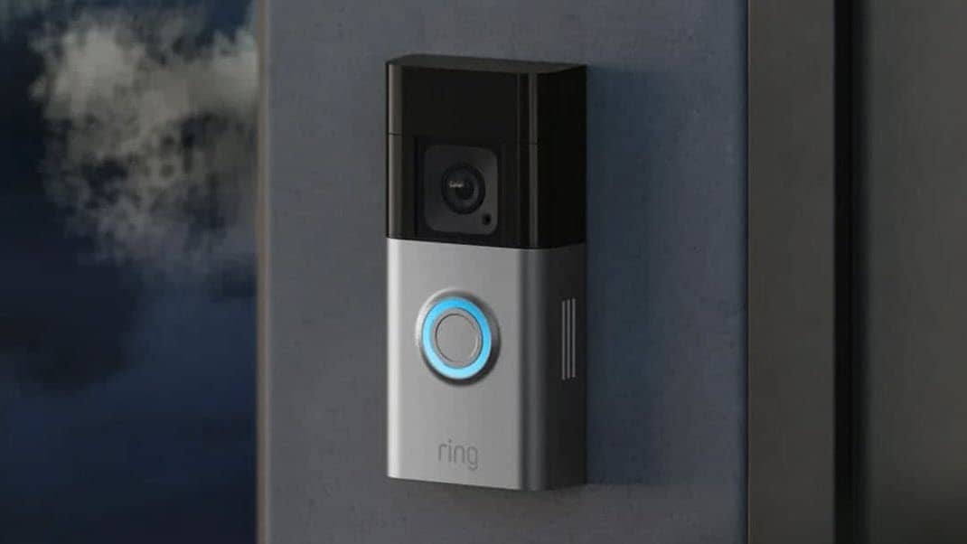 A smart Ring doorbell installed by the front door.