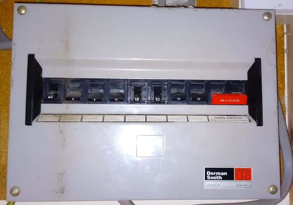 This is an older consumer unit found in an Edinburgh home during an EICR.