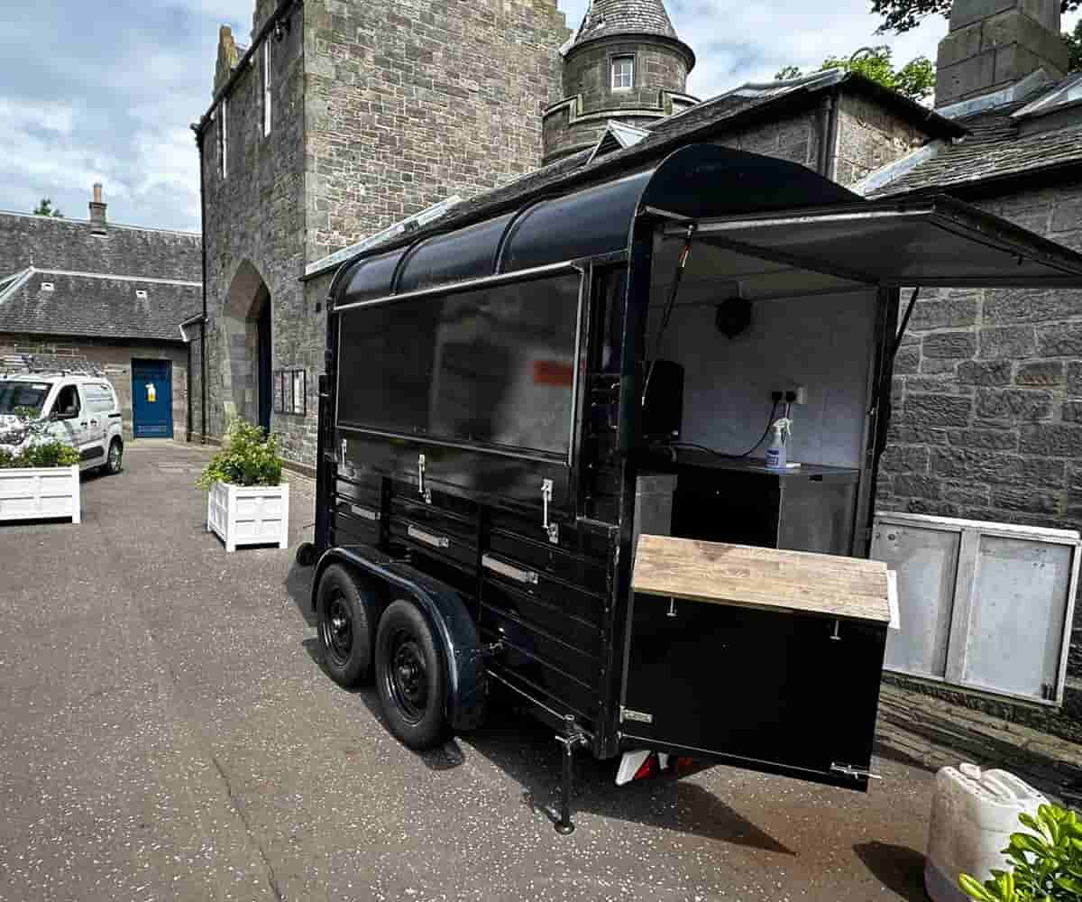 Safely running external power supply to new coffee stand (a converted horse box!)