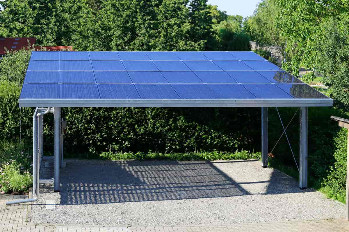 Commercial solar car ports consist of elevated frames that support solar panels.