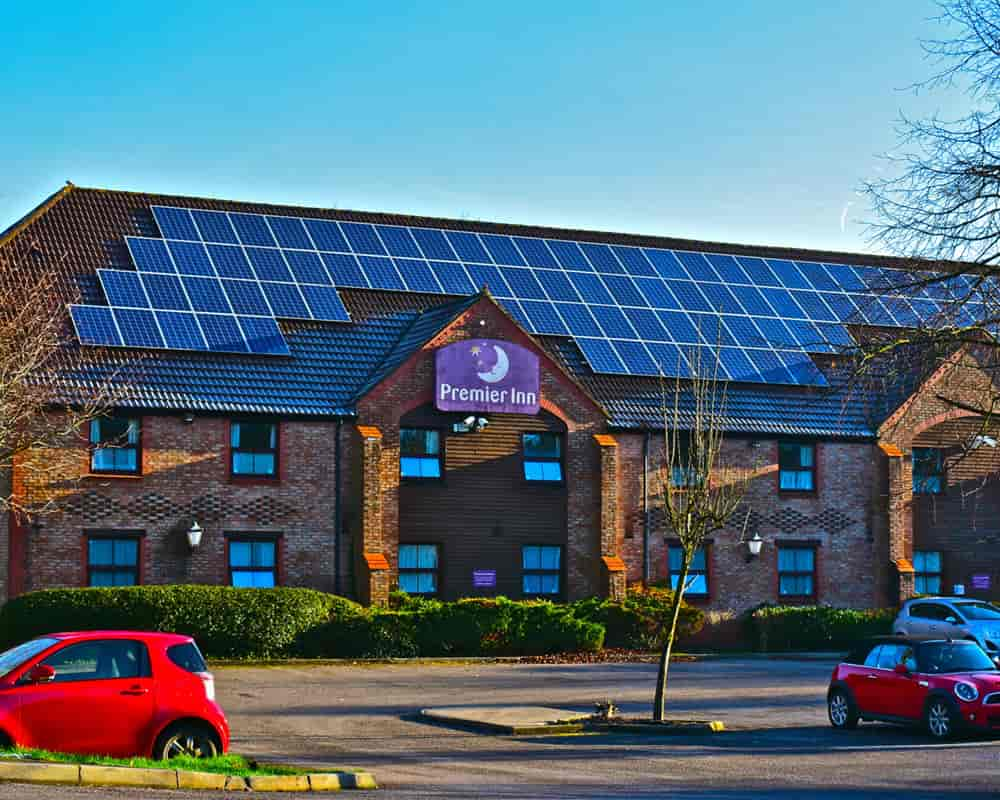 Solar PV panels installed on hotel roof.